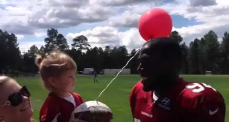 Little Girl Meets Her Football Hero