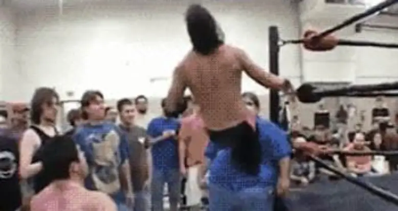 An Audience Member Gets Used As A Prop For Wrestling Match