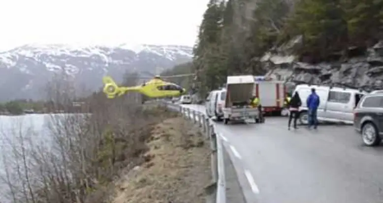 Helicopter Balances On Guardrail At Accident
