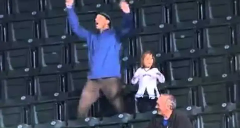 Dad Dances With Kids At Baseball Game