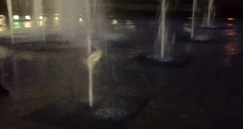 Putting A Frisbee On A Fountain