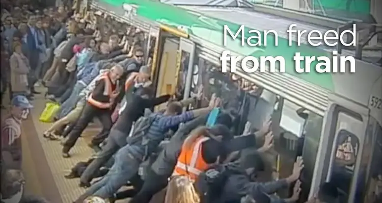 People Power Frees Man Trapped By Train