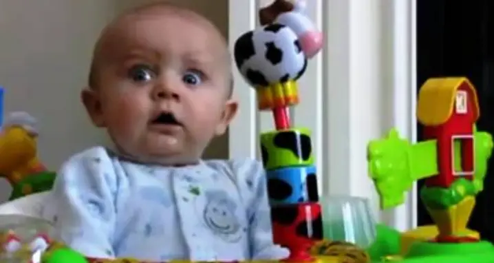 Baby Equally Amused And Terrified By Nose Blowing