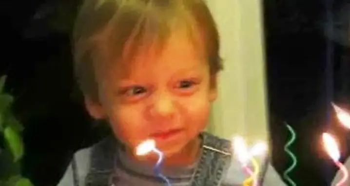 Two Year Old Blows Out Candles Awkwardly