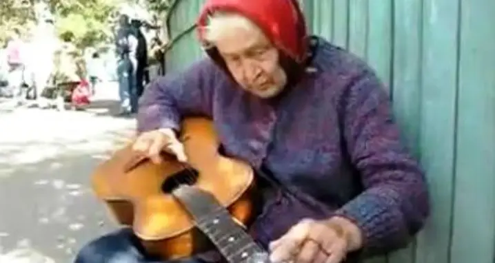Russian Grandma Rocks Guitar