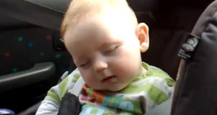 An Adorable Baby Tries To Stay Awake