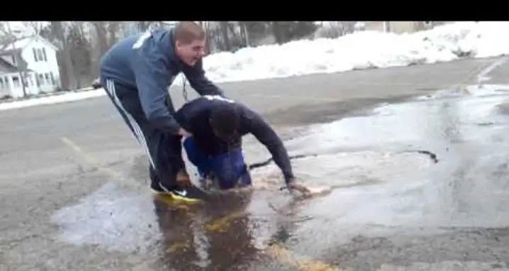 Kid Jumps Into A Puddle